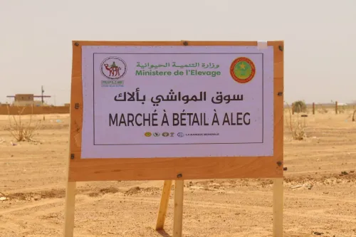 خ